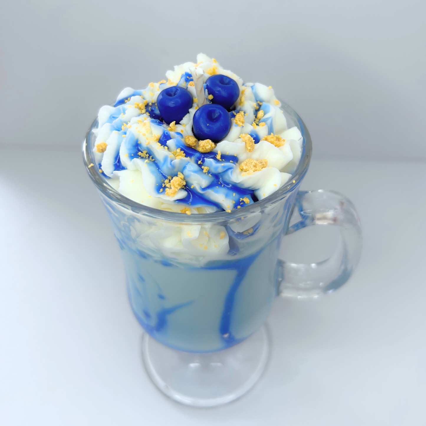Close-up of Blueberry Milkshake Candle details, highlighting syrup drips, creamy texture, and handcrafted toppings.