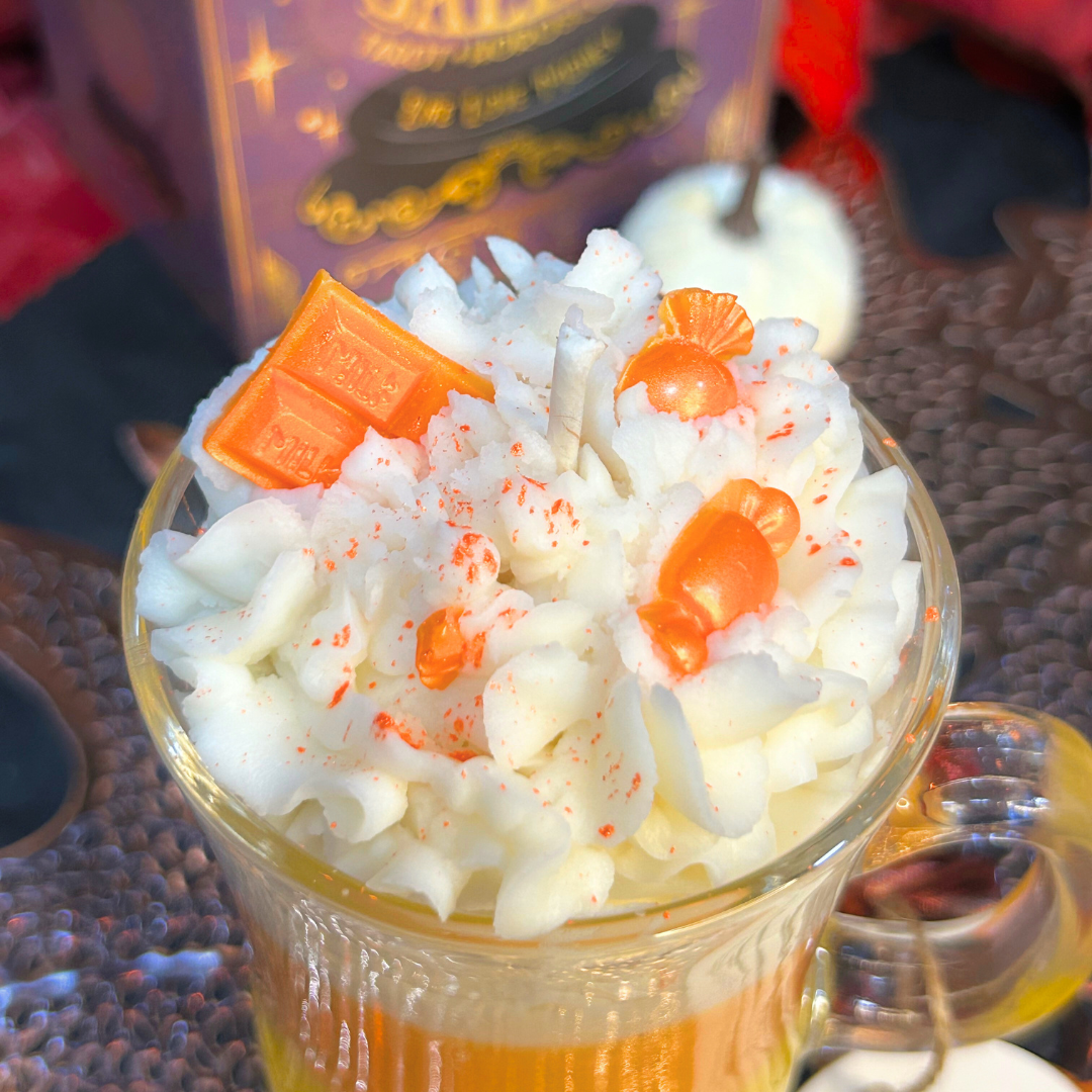 Closeup of Candy Corn Candle layers highlighting creamy vanilla, bright lemon, and fruity mandarin cranberry colors.