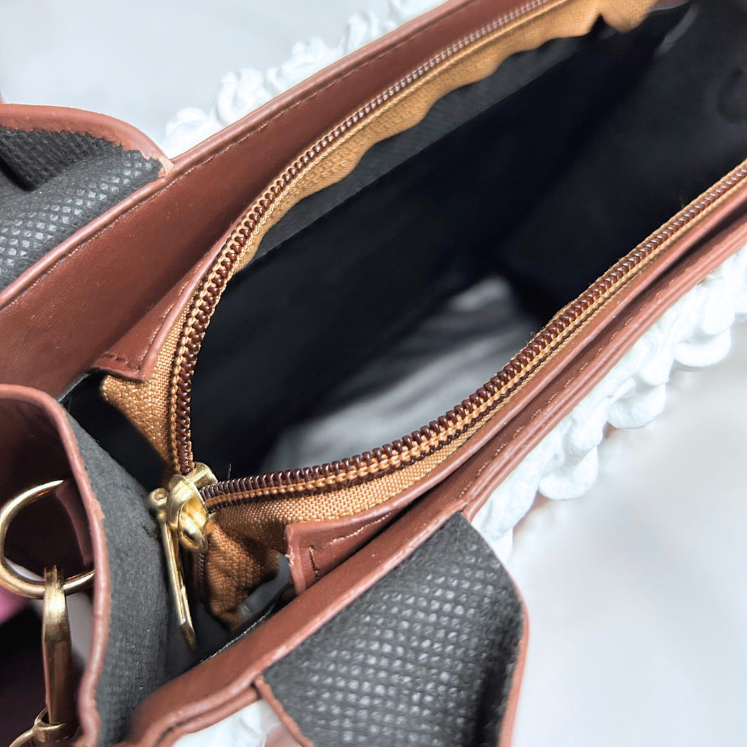 Open zipper view showing the interior polyester lining of the Chocolate Bar Purse.