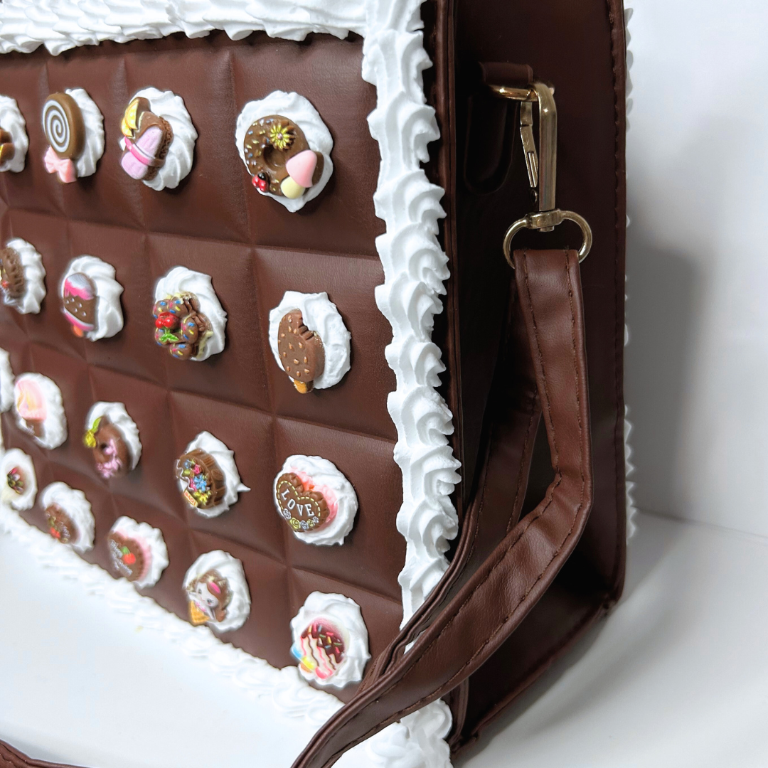 Side close-up showing frosting edge detail on the Chocolate Bar Purse.
