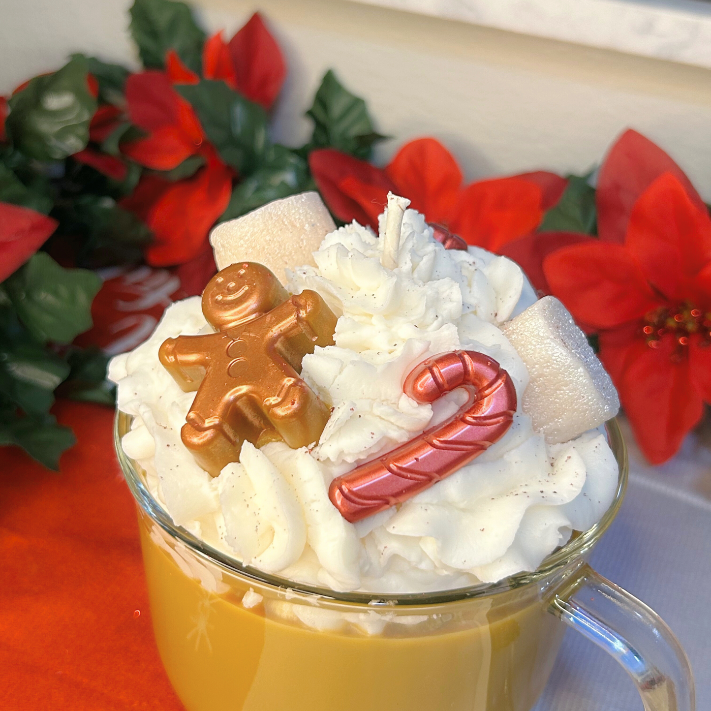 Close-up view of the opposite side of the Christmas Hot Chocolate candle with marshmallow and candy cane toppers.