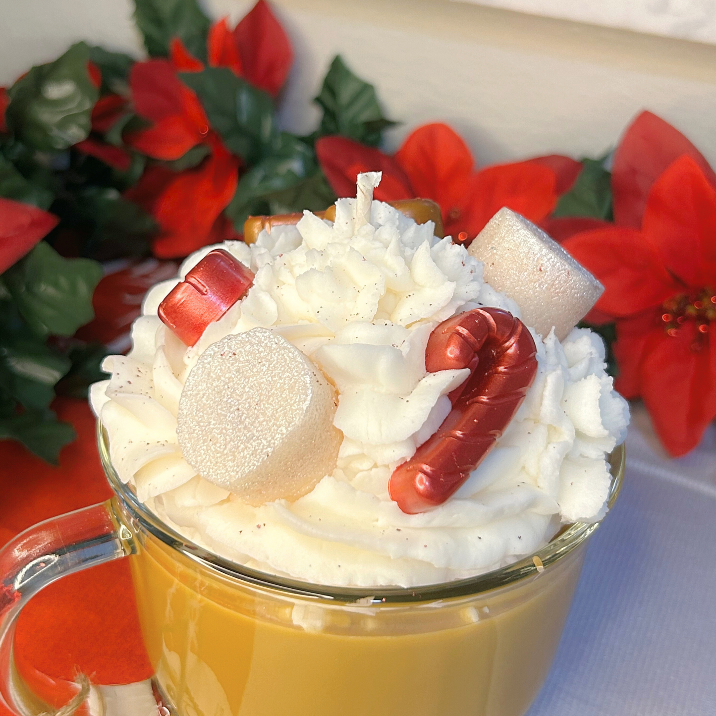 Close-up side view of Christmas Hot Chocolate candle with layers of s’mores, cinnamon vanilla, and decorative toppings.