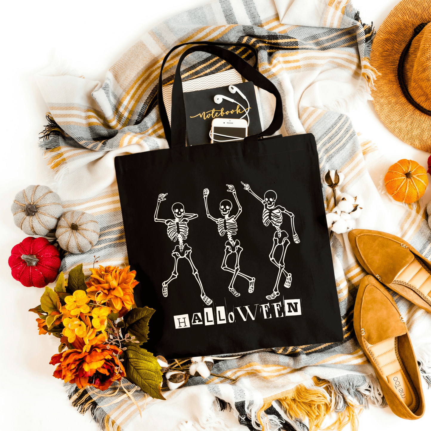Black Dancing Skeleton Halloween tote made from 12oz canvas, perfect for trick-or-treating and everyday essentials.