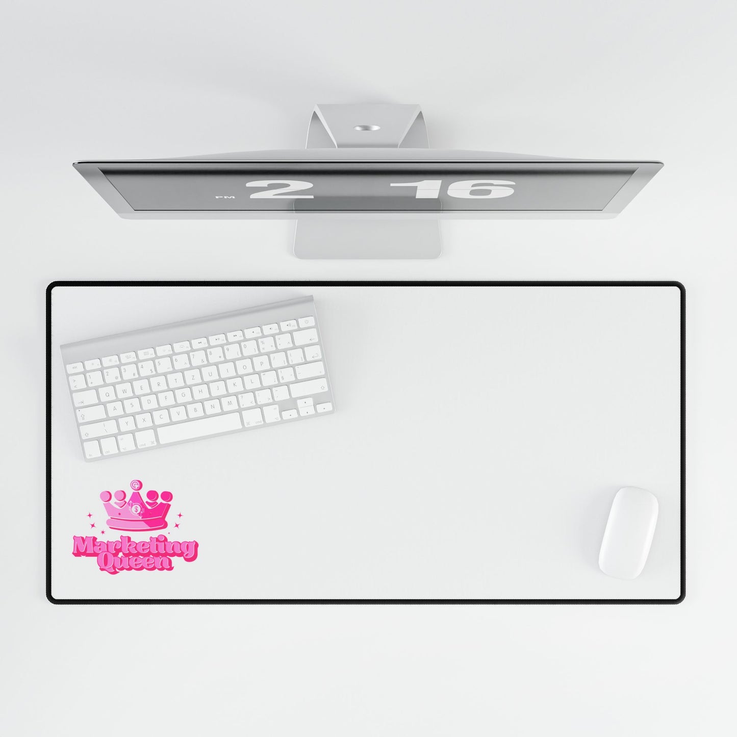 Top-down view of Marketing Queen Desk Mat on a desk with computer and office accessories – bold pink design, anti-fray edges, perfect for work or study.