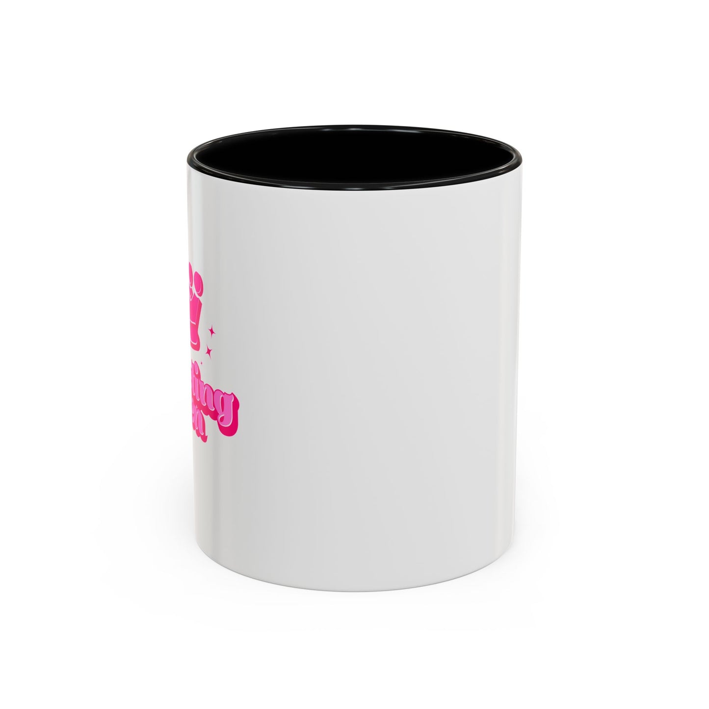 White mug with black interior and pink text on a white background