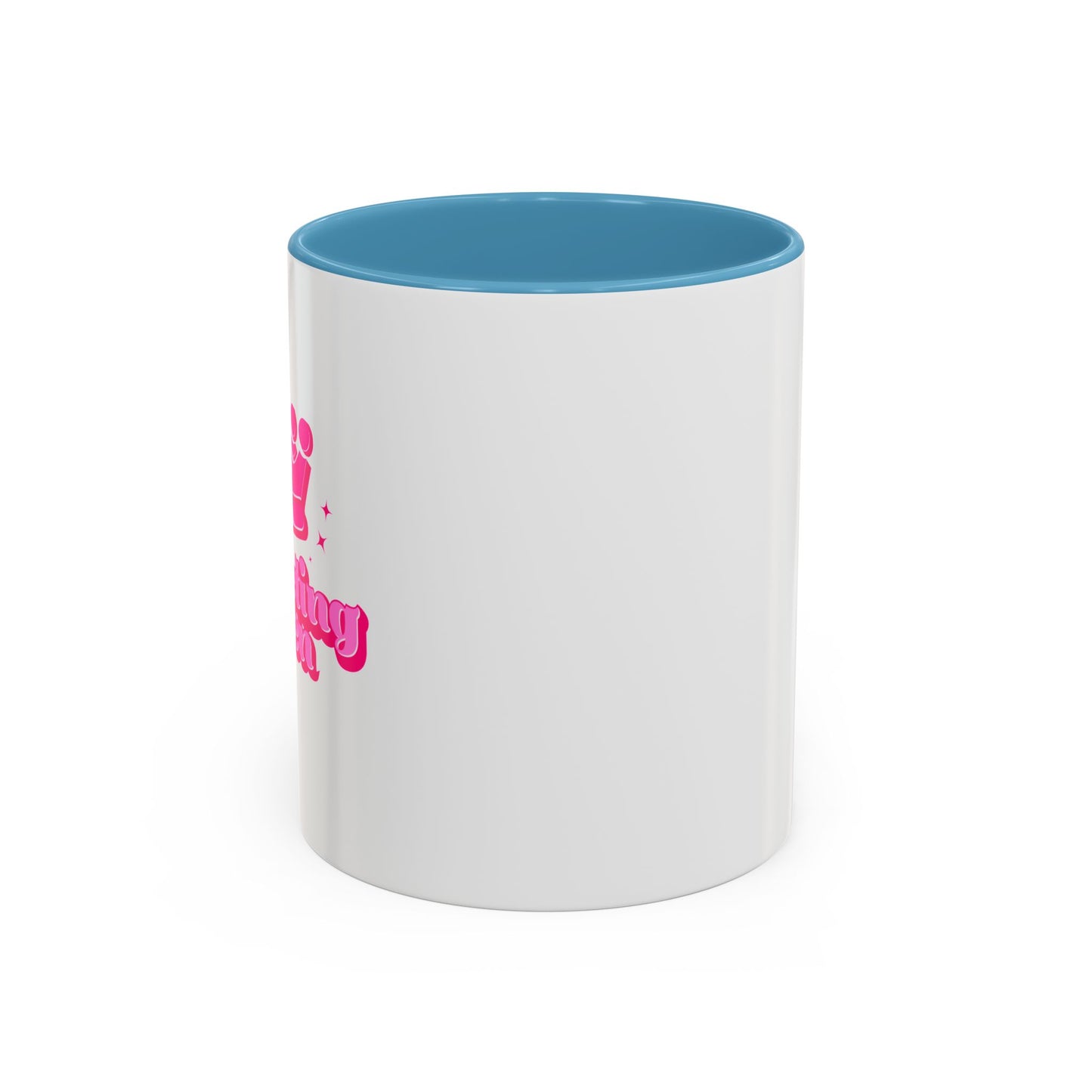 White mug with blue interior and pink text on a white background