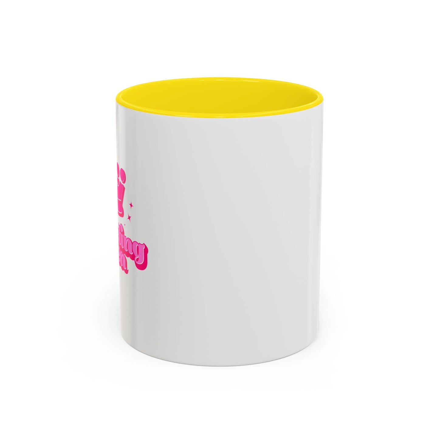 White mug with yellow interior and pink text on a white background