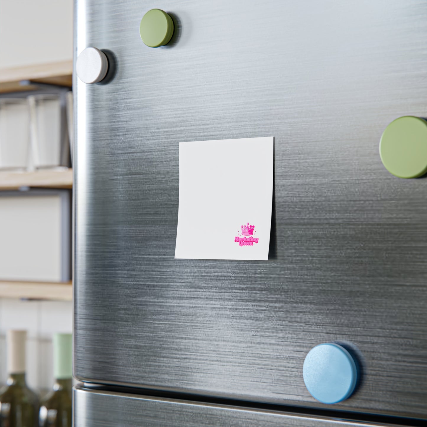 Marketing Queen Post-it Note Pad stuck on a cabinet, demonstrating practical use.