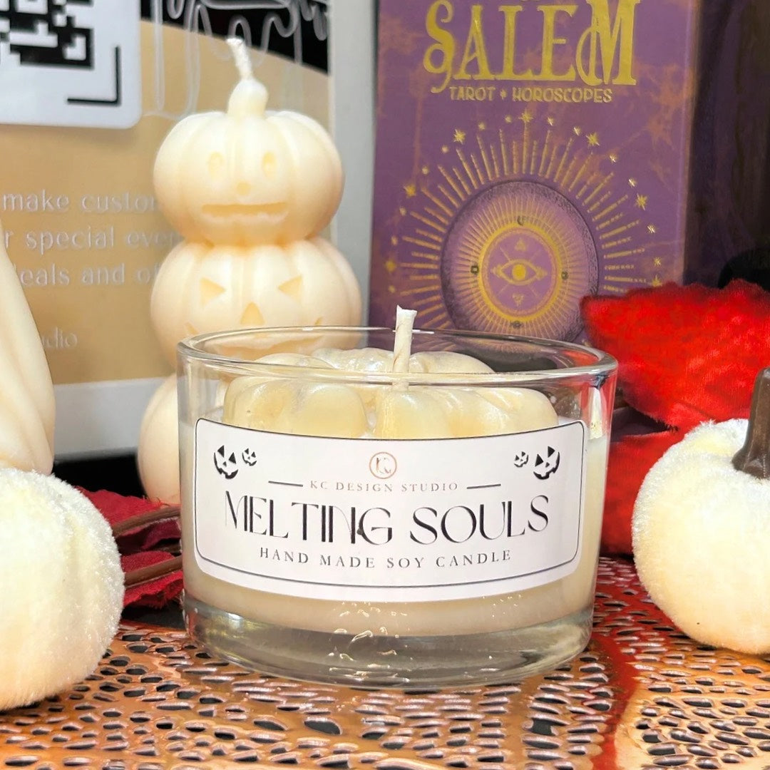 Front view of the Melting Souls Halloween candle featuring three melting skulls, inspired by gothic décor and the Corpse Bride aesthetic.