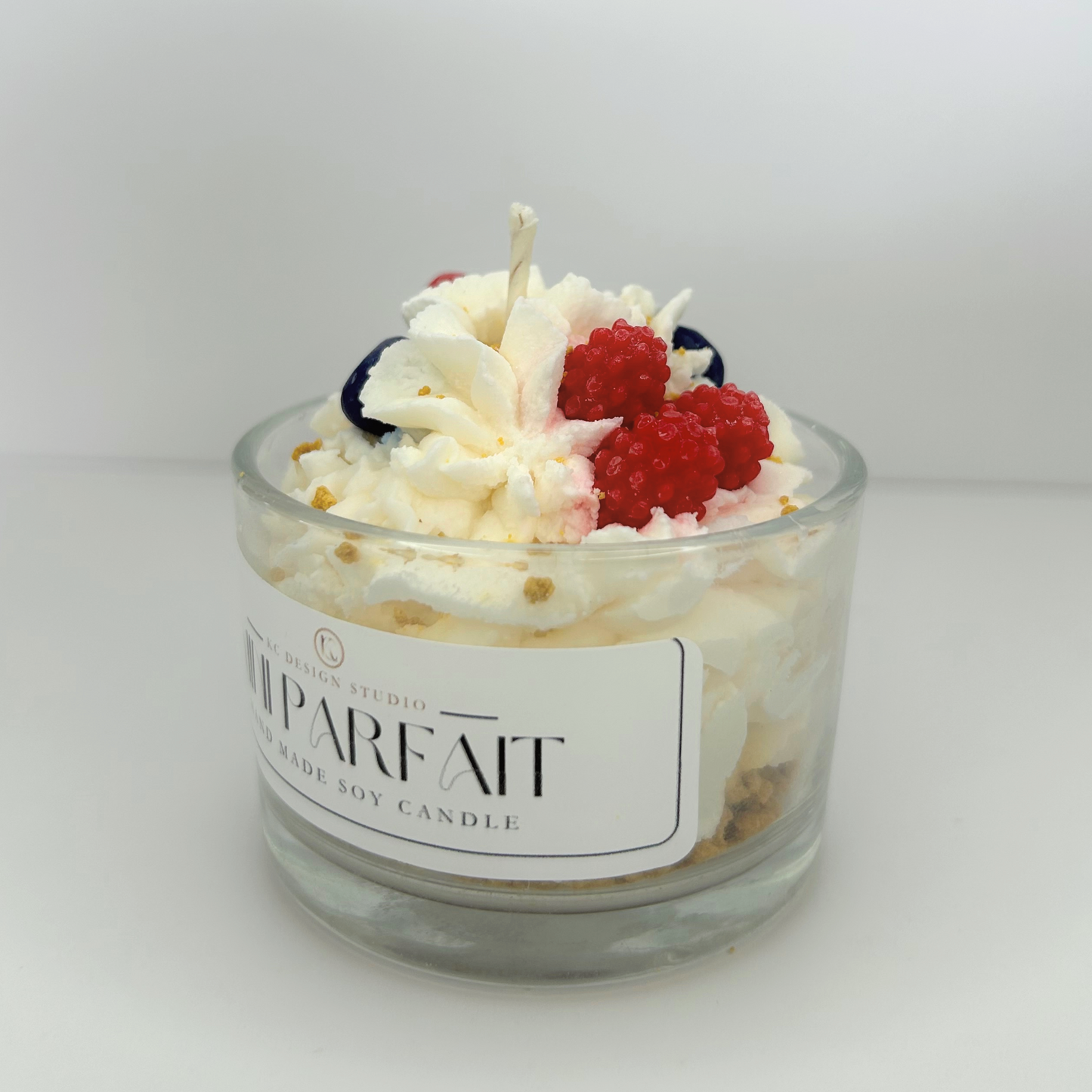 Side view of the Mini Parfait Candle, emphasizing its fruity toppings and layered structure, perfect for decorative accents.