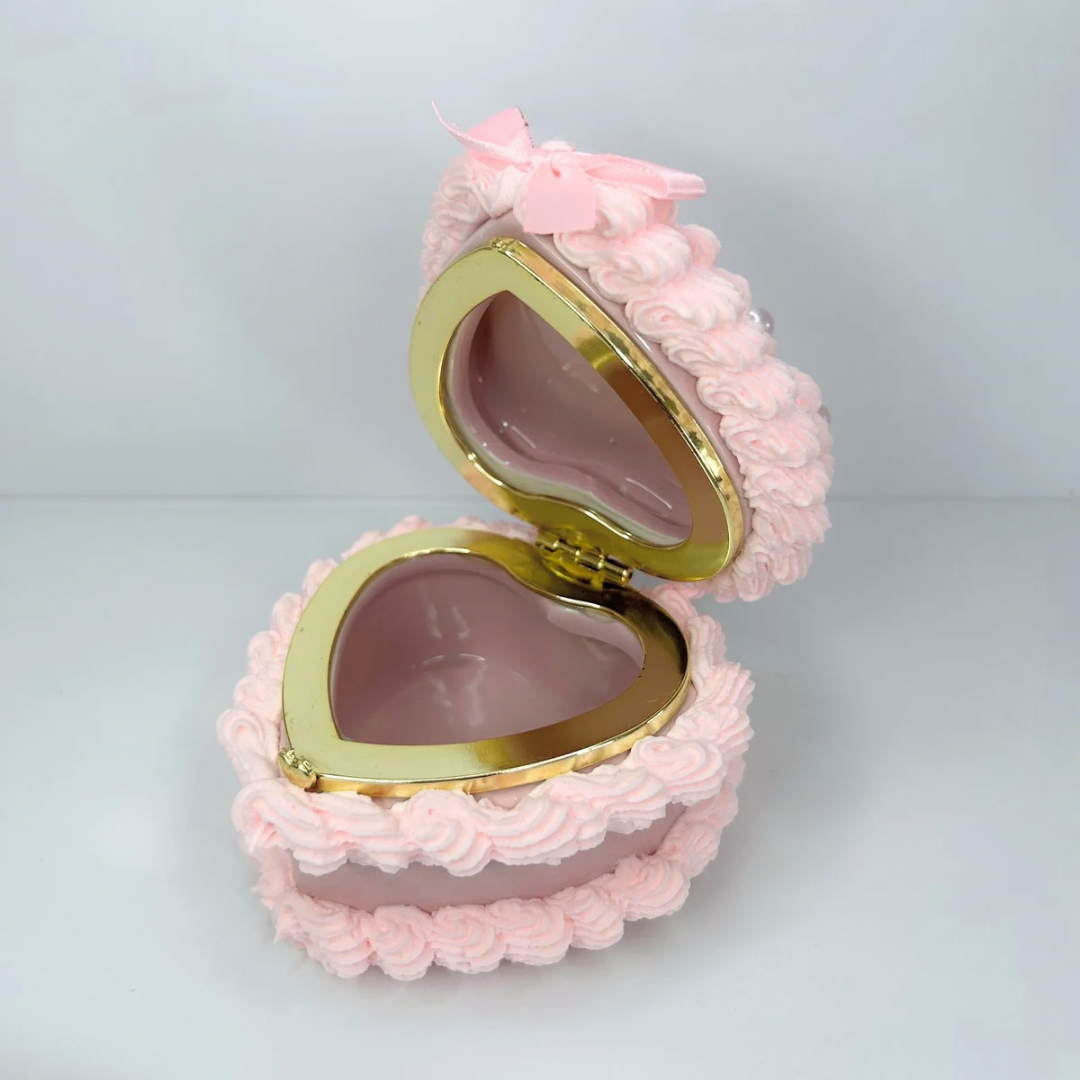Open view of the Mini Strawberry Cake Jewelry Box, revealing its spacious interior for storing rings, earrings, and tiny treasures.