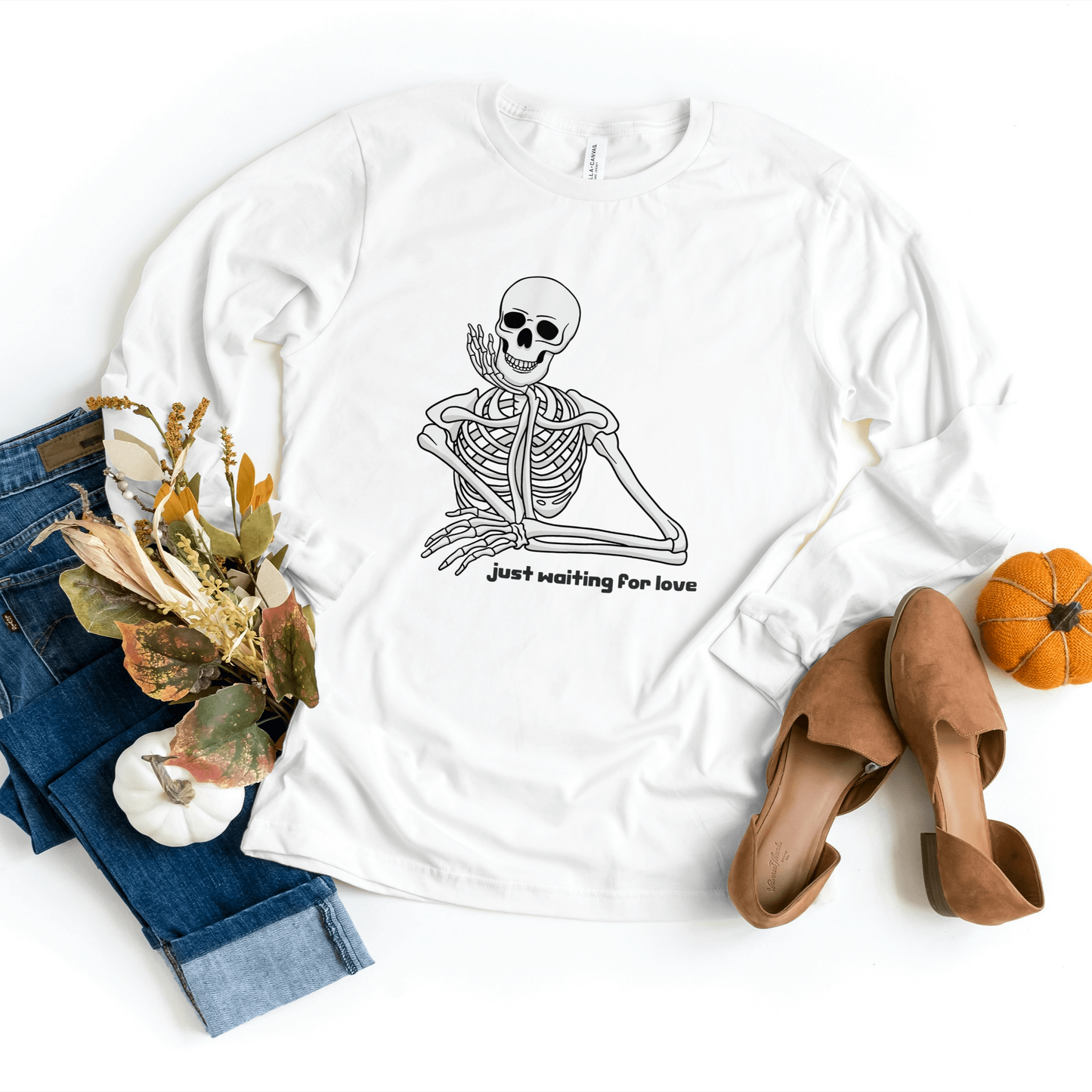 White Waiting For Love Sweatshirt showcasing a skeleton waiting design, ideal for Halloween celebrations.