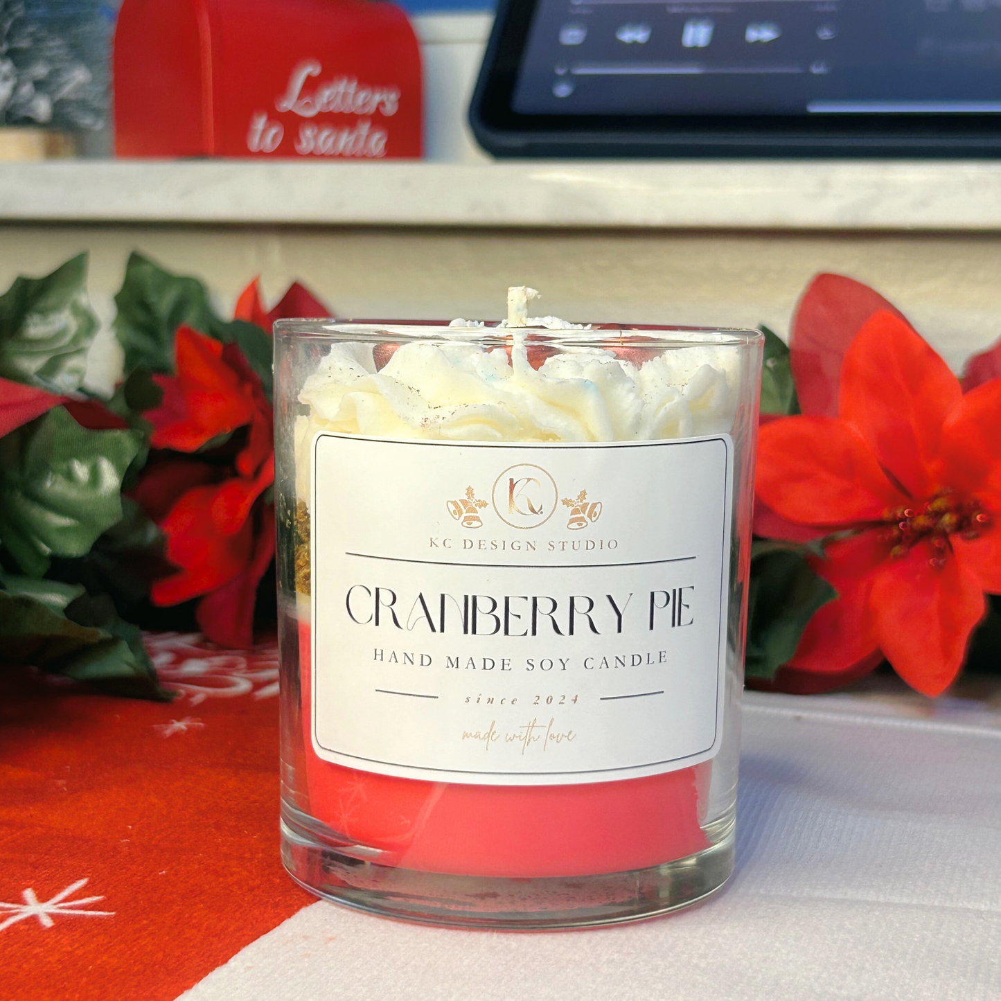 Handcrafted 4oz cranberry pie candle with rich red and creamy white layers in eco-friendly soy wax.