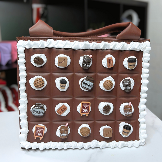 Chocolate-themed bag with decorative elements resembling coffee cups and milk bottles on a white surface.