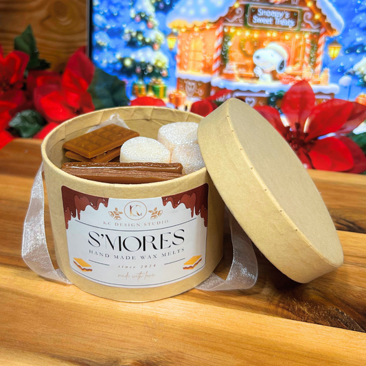 S'mores wax melts in a decorative container with a festive background