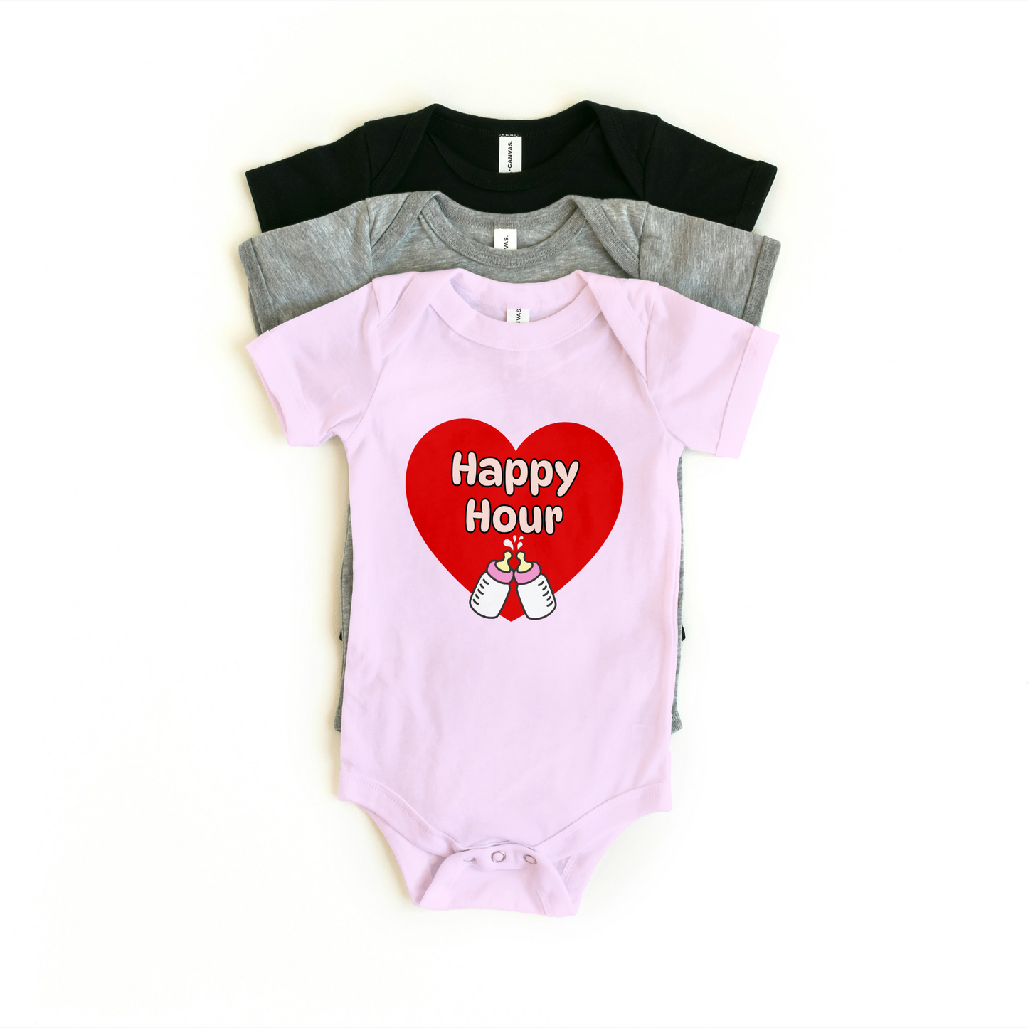 Baby Onesie in pink with "Happy Hour" design featuring a red heart and two baby milk bottles, soft cotton for comfort.