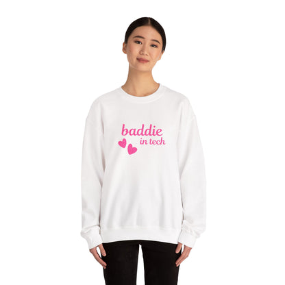 Woman wearing Baddie in Tech sweatshirt – bold pink text with two floating hearts, unisex crewneck, stylish and cozy for casual, creative, or tech-inspired outfits.