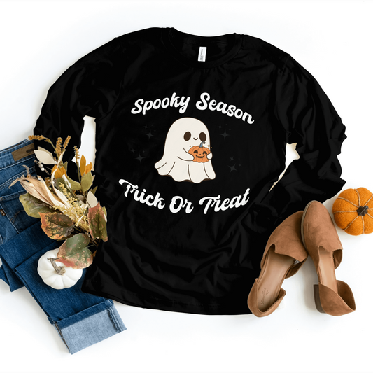 Black Trick or Treat Sweatshirt featuring a cute ghost holding a pumpkin basket, perfect for Halloween festivities.