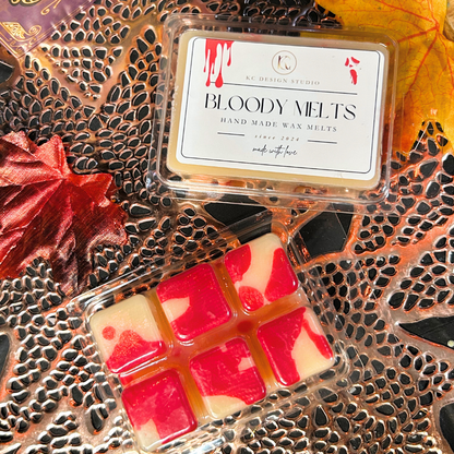 Bloody Melts wax melts packaging and back red view with a decorative background