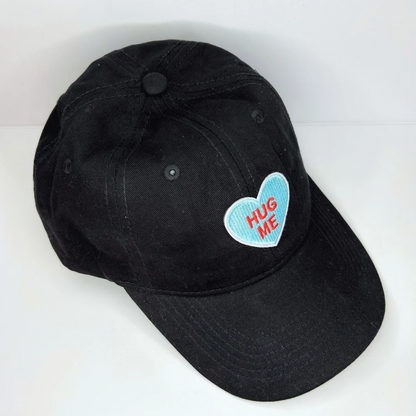 Blue Hug Me heart design cotton cap with moisture-wicking fabric and ventilation eyelet for enhanced comfort, ideal for workouts and daily wear.