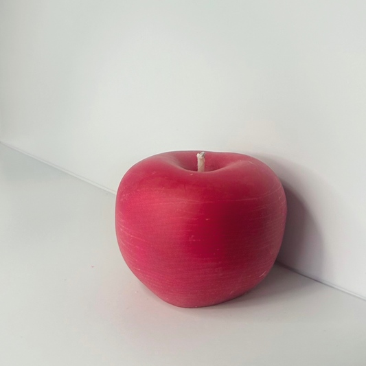 Front view of the Cranberry Apple Marmalade Candle showcasing its vibrant red color and elegant design.