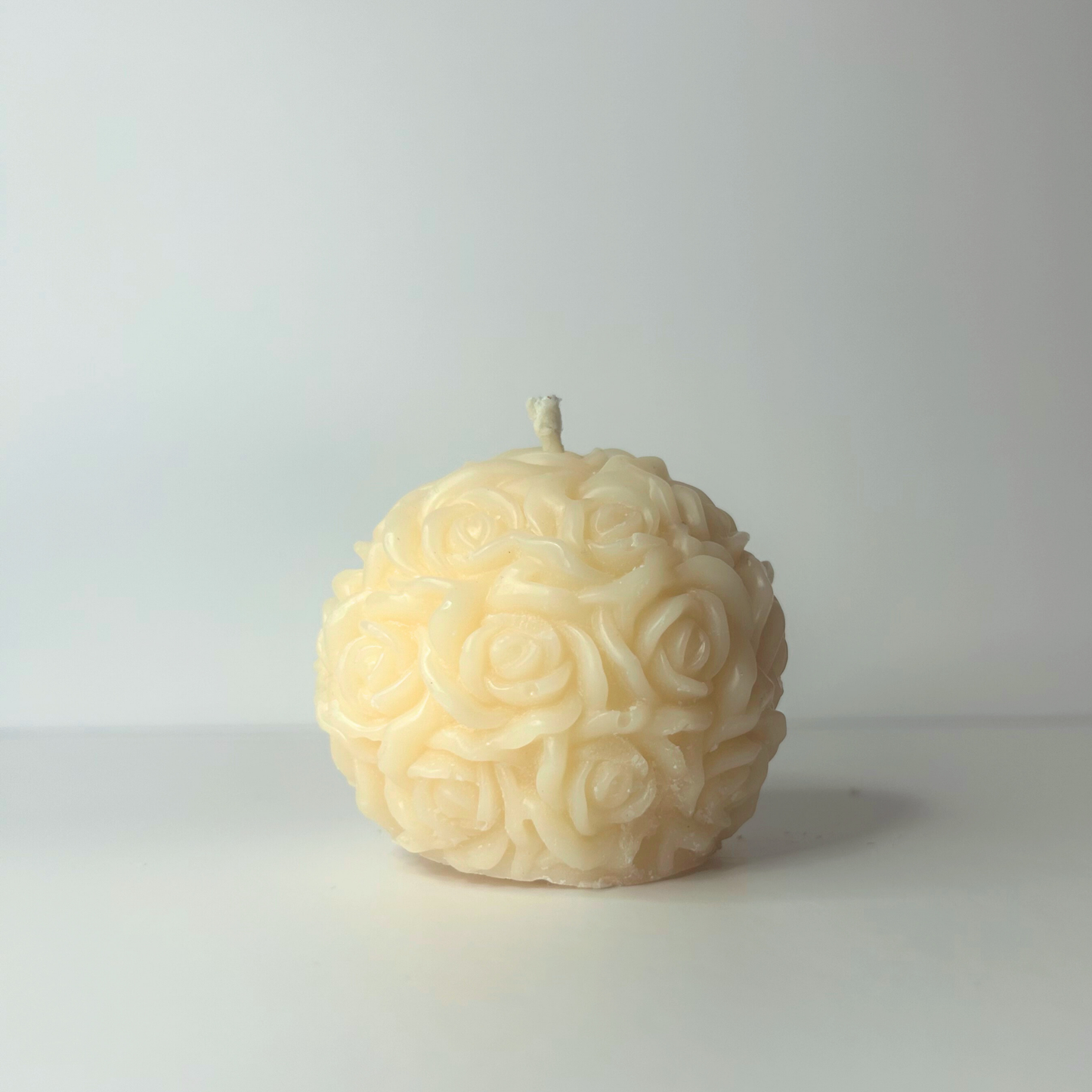 Front view of the Decorative Blossom Breeze Candle on a neutral background, highlighting its elegant appearance and eco-friendly features.