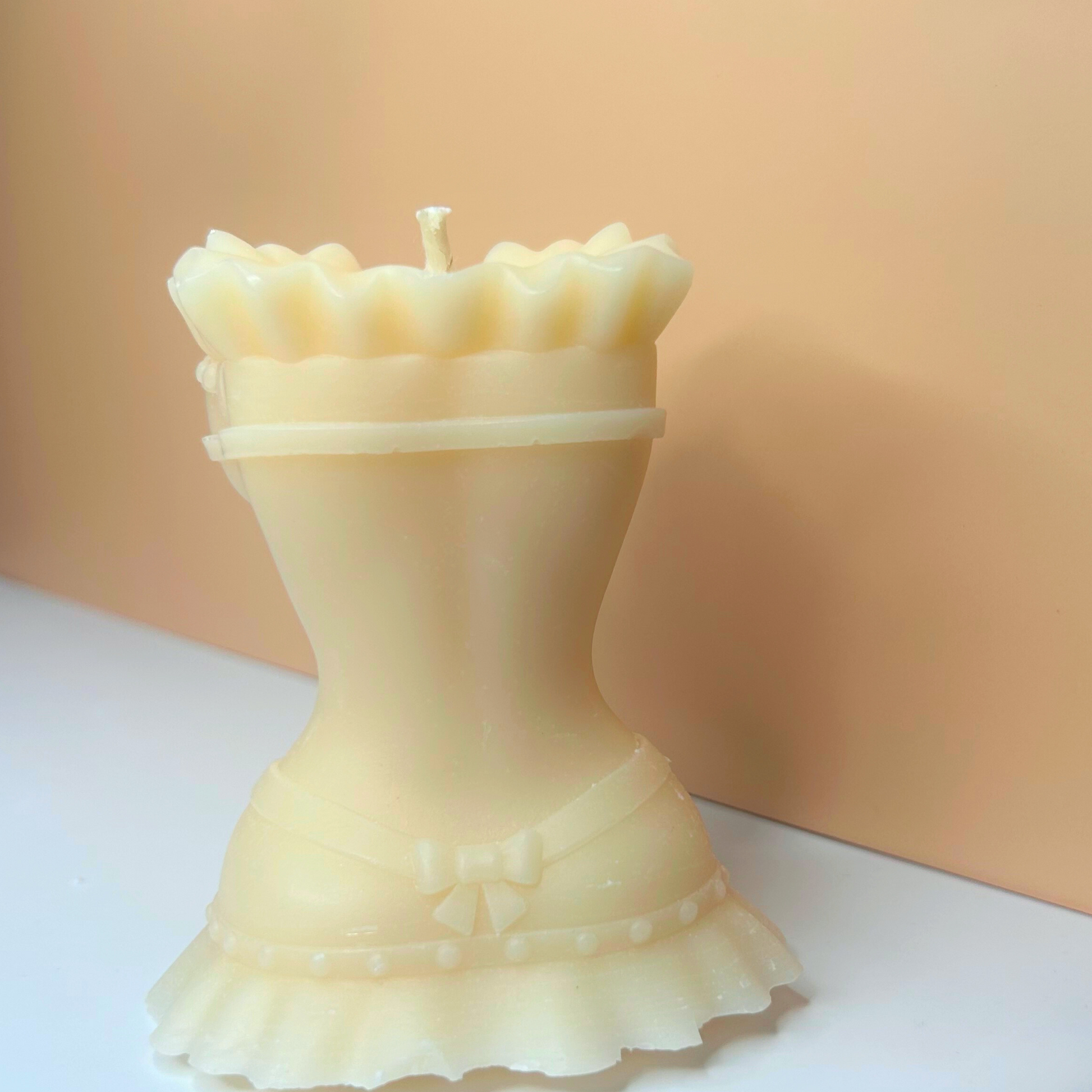 Back view of Decorative Victorian Lace Candle with delicate lace patterning.