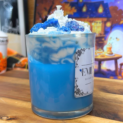 Side view of Emily’s Veil candle showing the light blue wax base and white whipped wax topping in a 10 oz vessel.