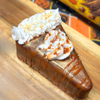 Top view of the Golden Pumpkin Pie candle highlighting the golden pie filling, whipped cream, realistic crumbs, and syrup drizzle.