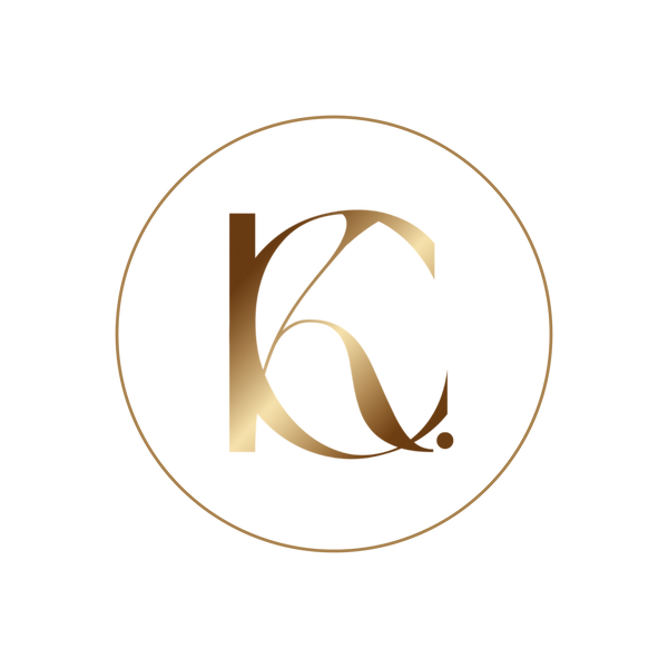 KC Design Studio logo in metallic gold, featuring intertwined letters K and C followed by a period, surrounded by a metallic gold ring, with a transparent background.