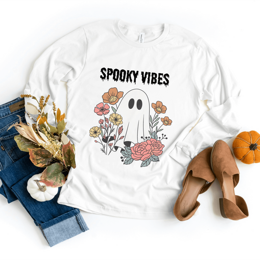 White Limited Edition Spooky Vibes Sweatshirt featuring a cute ghost surrounded by colorful flowers, perfect for celebrating Halloween in style.