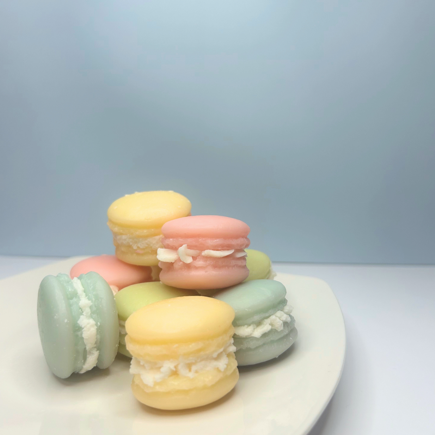 All Macaroon wax melts stacked on a plate, creating a visually appealing display of colors and sweetness.