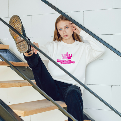Marketing Queen long sleeve t-shirt in white on a woman sitting on a staircase – bold pink graphic, comfy fit, part of the Marketing Girly Collection.