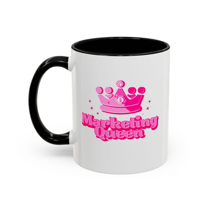 White mug with black handle featuring a pink crown and "Marketing Queen" text on a white background