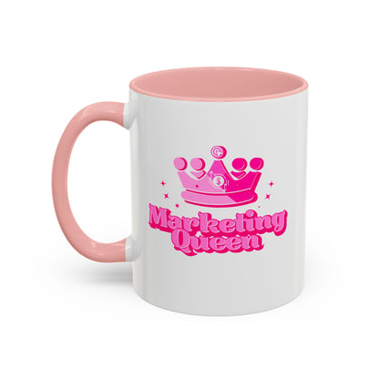 White mug with pink interior and handle, featuring a pink crown and 'Marketing Queen' text on a white background.