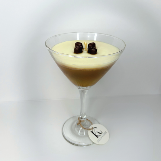 Front view of a luxurious 9.5 oz martini candle featuring cappuccino espresso, French vanilla, and coffee house scents, elegantly presented in a stylish martini glass topped with coffee beans.