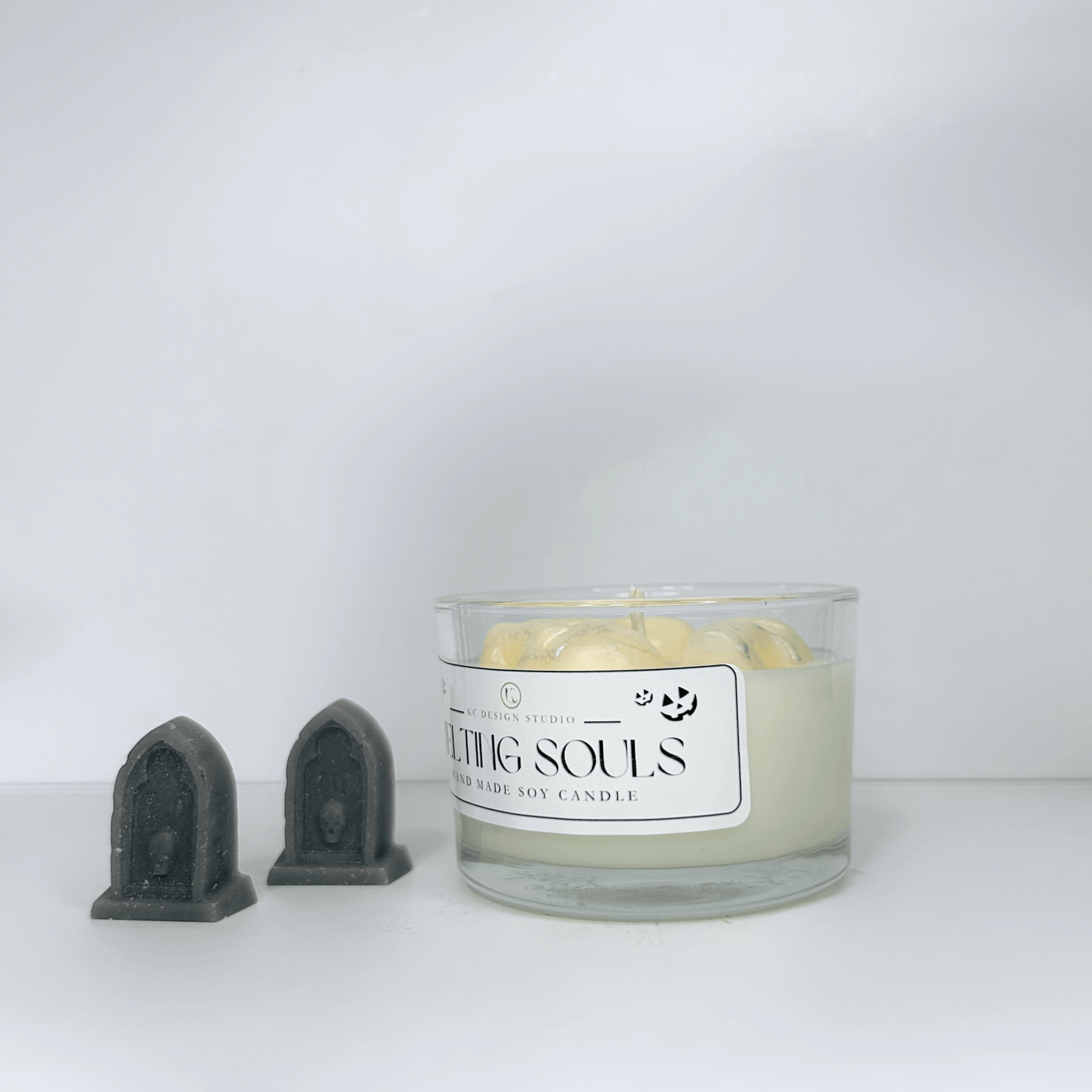 Side view of the Melting Souls Candle, highlighting the eco-wick and the elegant 4oz vessel design.
