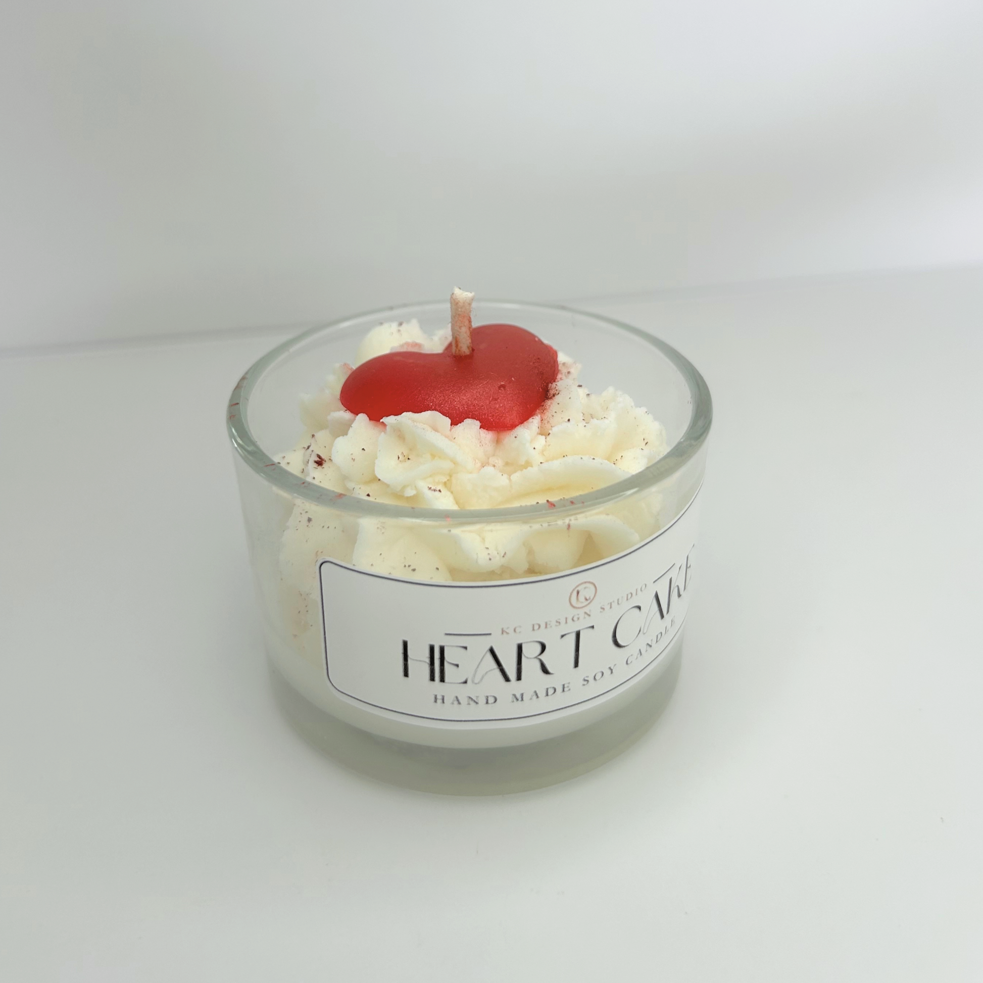 Angled view of the Heart Cake Candle, displaying its charming shape and elegant design.