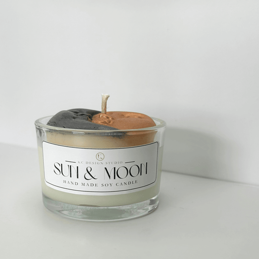 Close-up of the Mini Sun & Moon Candle showcasing the sparkly double-colored sun and moon design.