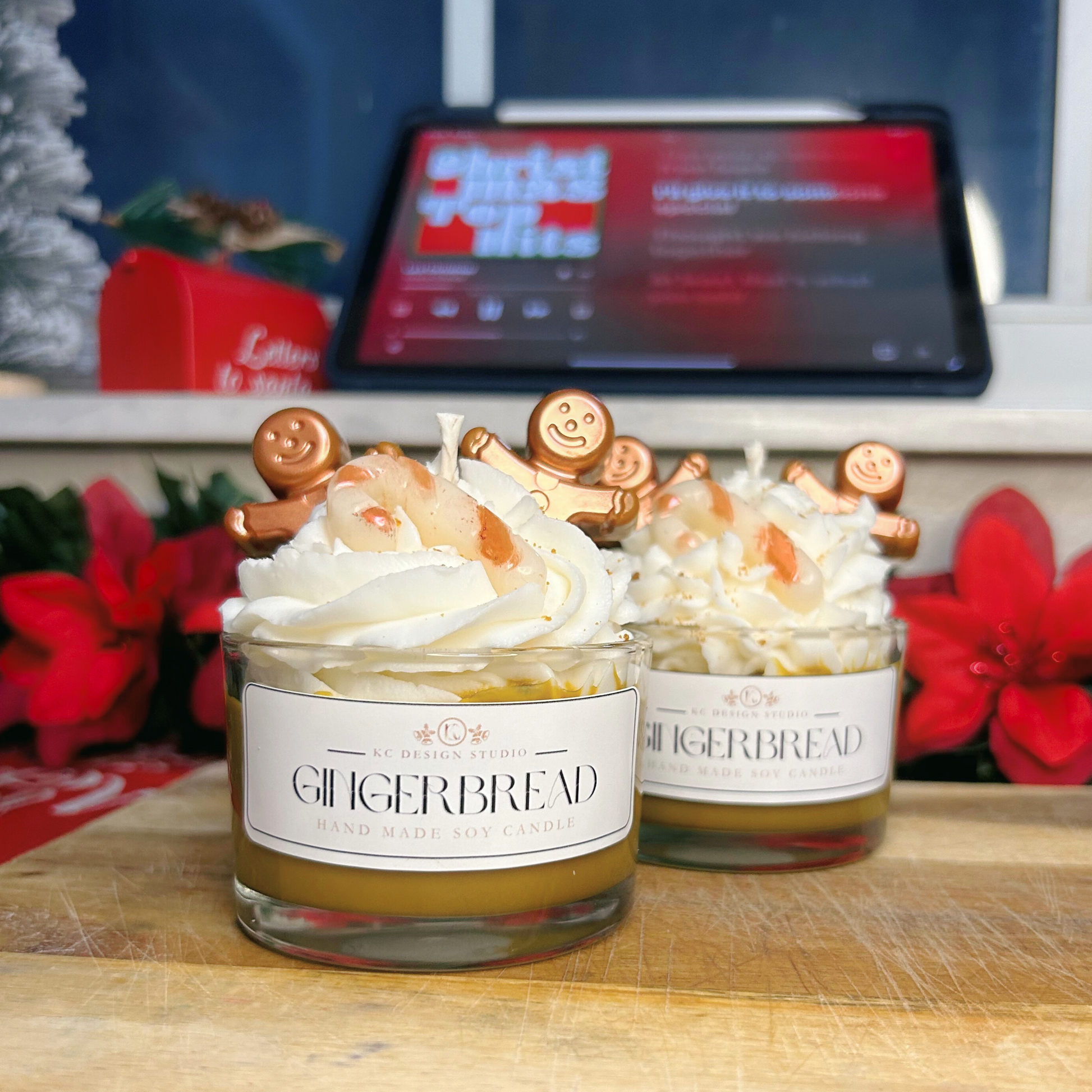 Pair of handcrafted Christmas gingerbread candles with festive gingerbread, vanilla, and salted caramel scents.