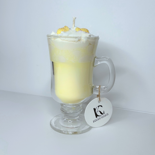 Piña Colada scented candle front view with yellow and white layered wax and mini pineapple toppings