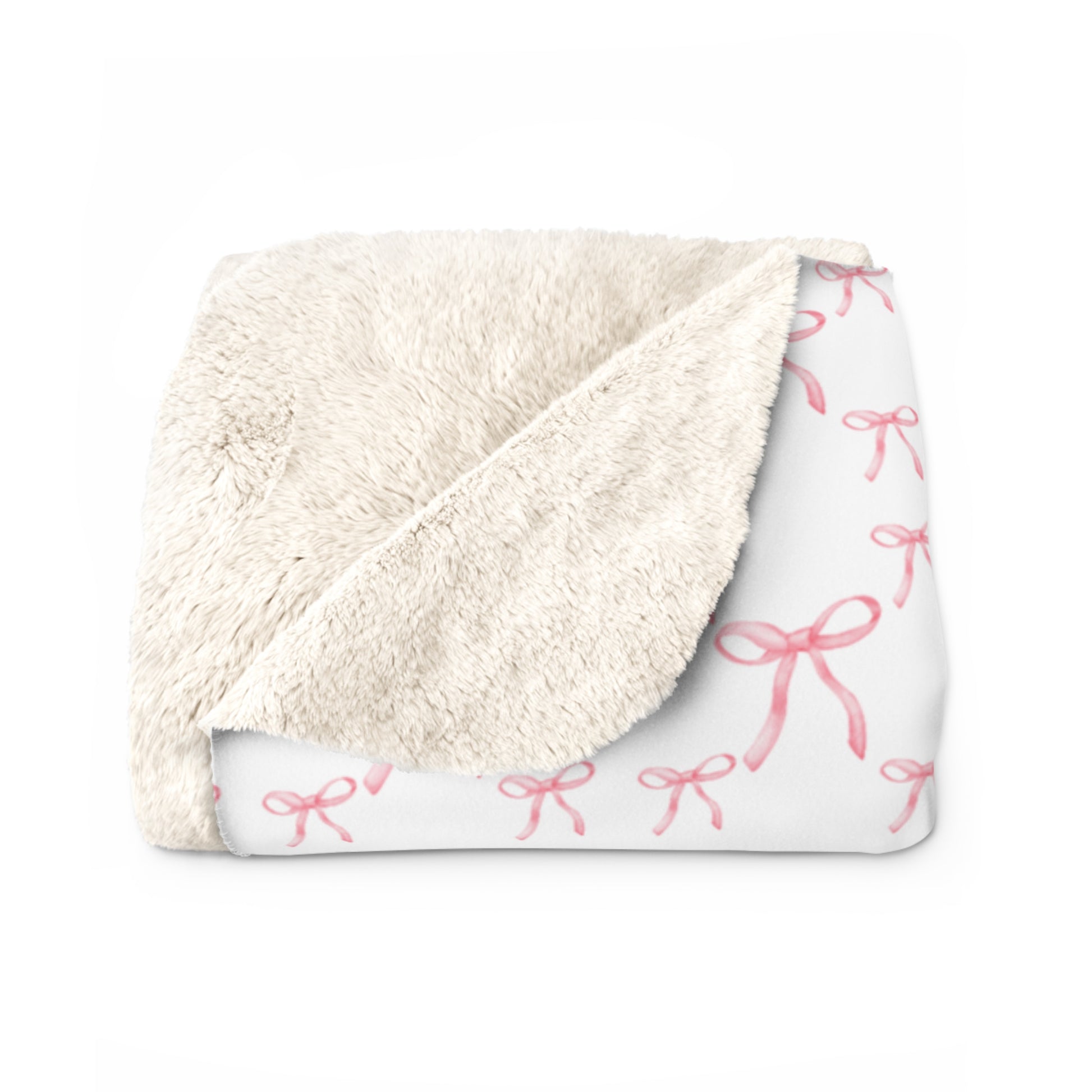 Blanket with pink bow pattern on a white background