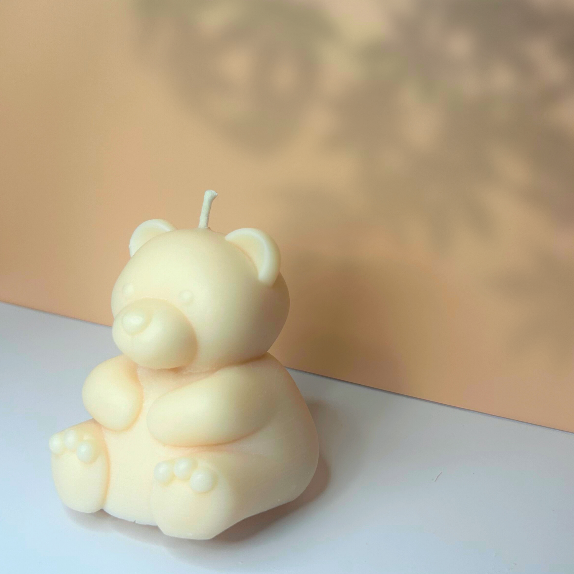 Side view of the Polar Bear Marshmallow Candle, displaying its charming shape and eco-friendly design.