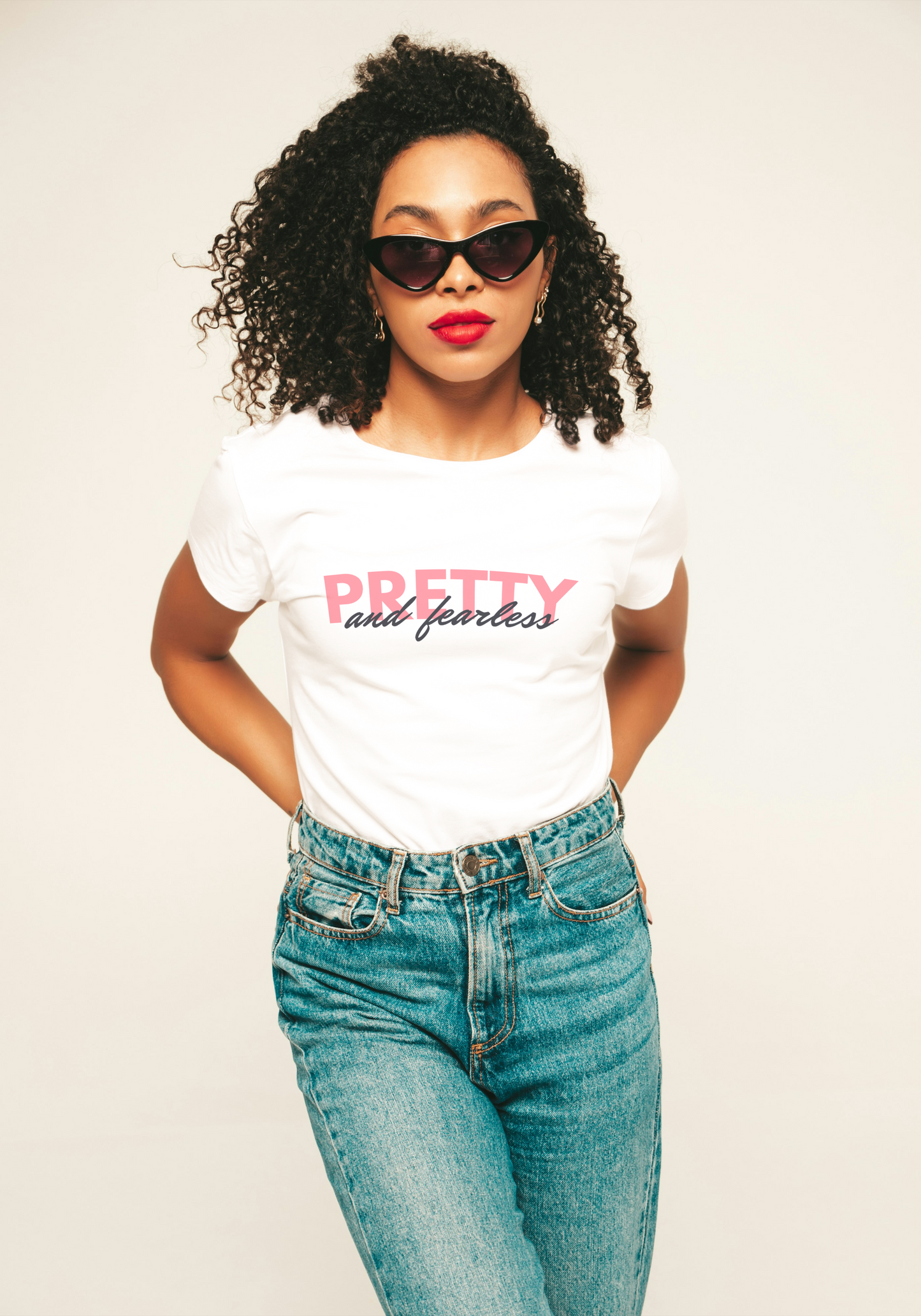 Softstyle "Pretty & Fearless" White T-shirt made from 100% ringspun cotton, offering a modern classic fit, comfort, and smooth printing surface for both work and play.