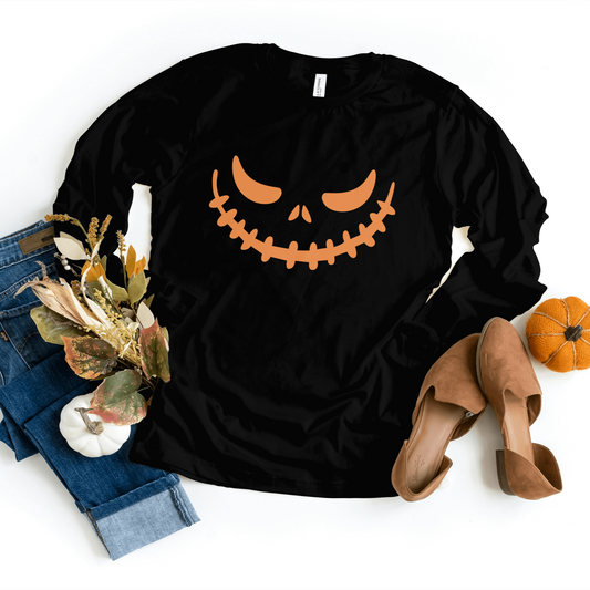 Cozy black Pumpkin Face Sweatshirt made from a soft 50/50 cotton/polyester blend, perfect for Halloween festivities.
