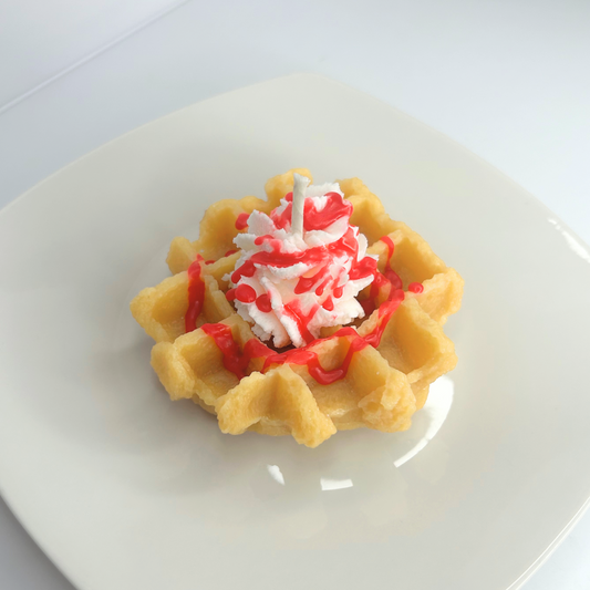 Front view of decorative Red Velvet Waffle Candle featuring its vibrant color and appealing design.