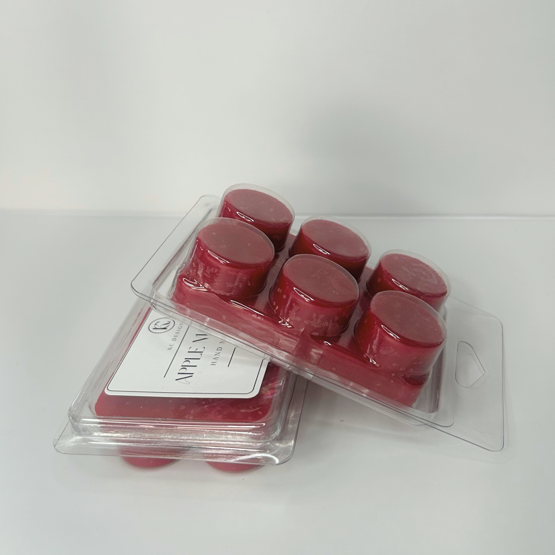 Side view of Cranberry Apple Marmalade wax melt tablet showing its back side