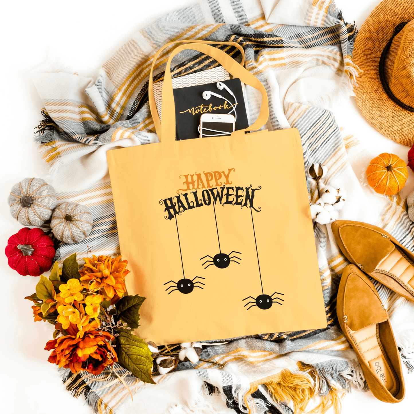 Orange Spider Halloween tote made from heavy-duty canvas, ideal for carrying candy hauls and essentials during spooky season.