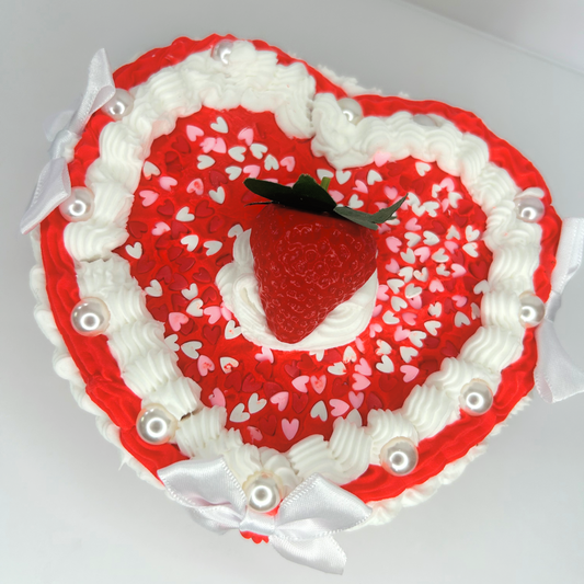 Top view of the Strawberry Heart Cake Vintage Jewelry Box featuring vibrant red and white colors, strawberry toppings, and a heart-shaped design.