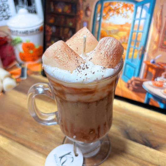 Angled view of the Toasted Marshmallow Mocha candle highlighting the layered coffee-inspired design, brown syrup marks, and toasted marshmallow topping.